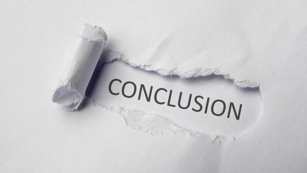 The word Conclusion revealed beneath torn paper